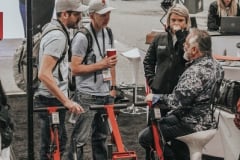 Kristen with customers at WOC