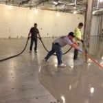 Spreading out the concrete overlay